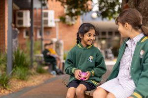 Prep and her Year 6 buddy chatting